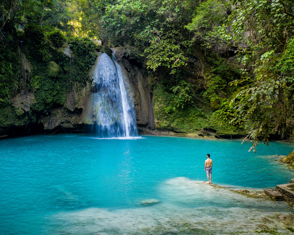 a beautiful blue waterfall in cebu